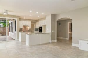 Vacant gallery style kitchen with breakfast bar