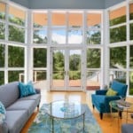 Living room surrounded by glass. Outdoor allergens not far from coming inside your home to create indoor allergies
