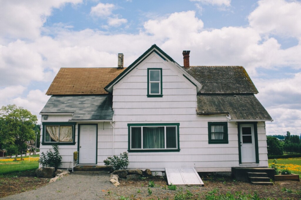 What is TLC in real estate? A photo of an older home that needs a bit of tender loving care to come into it's full potential