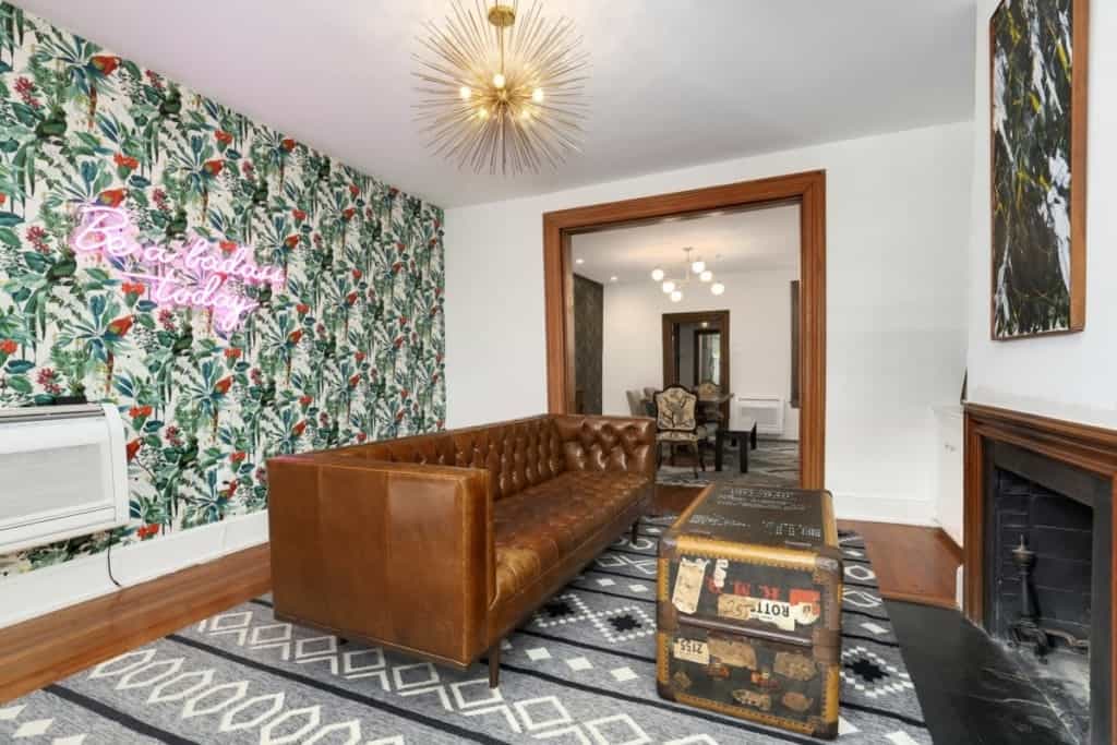 living space that leads into a dining room through one hallway