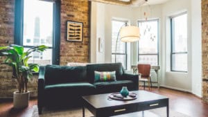 A high-rise apartment with natural lighting and exposed brick