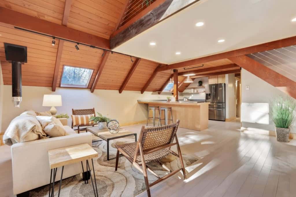 bamboo floor covering in a living space with couches and chairs