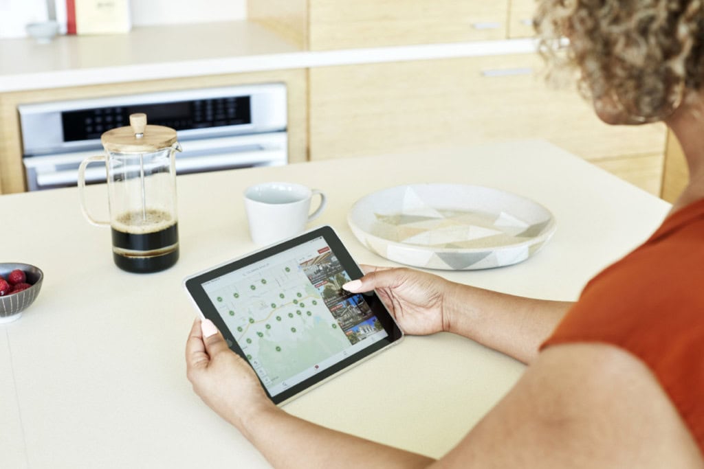 Woman looking at houses on Redfin