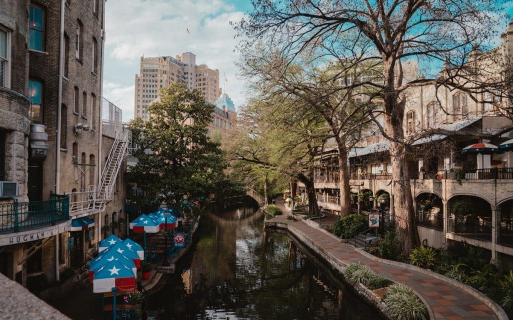 San Antonio River Walk with colorful umbrellas