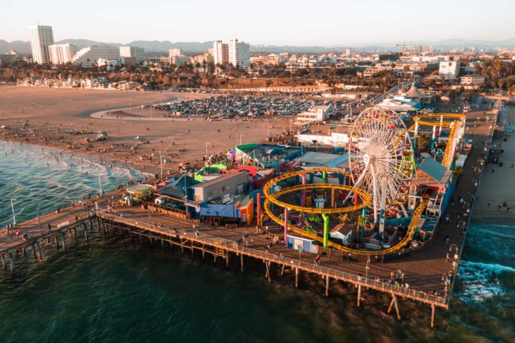 Santa Monica Pier at sundown with lights reflected in the Pacific Ocean _ getty