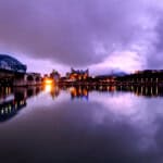 Chattanooga skyline and the Walnut Street Bridge reflecting on a calm Tennessee River after a storm. Chattanooga is the fourth-largest city in Tennessee and the seat of Hamilton County. Located in southeastern Tennessee.