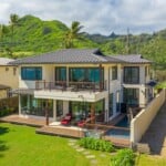 home in Laie Hawaii with undeveloped land next to it