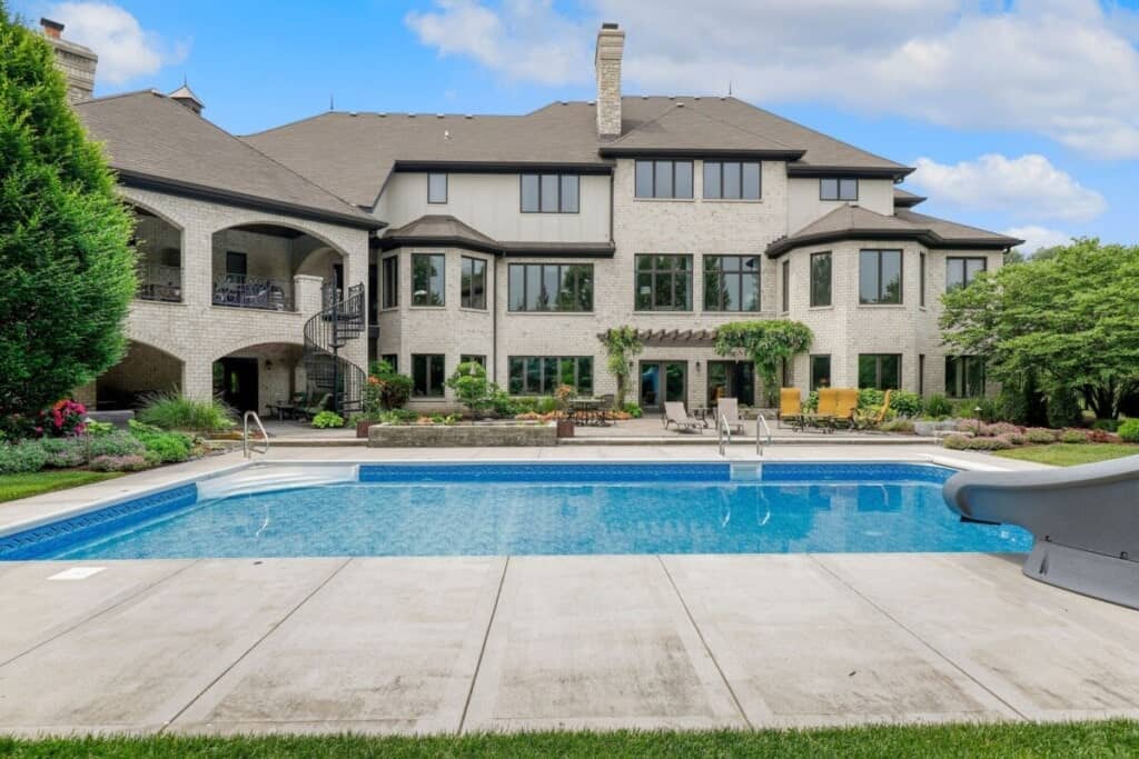 Backyard with an outdoor living space and a pool