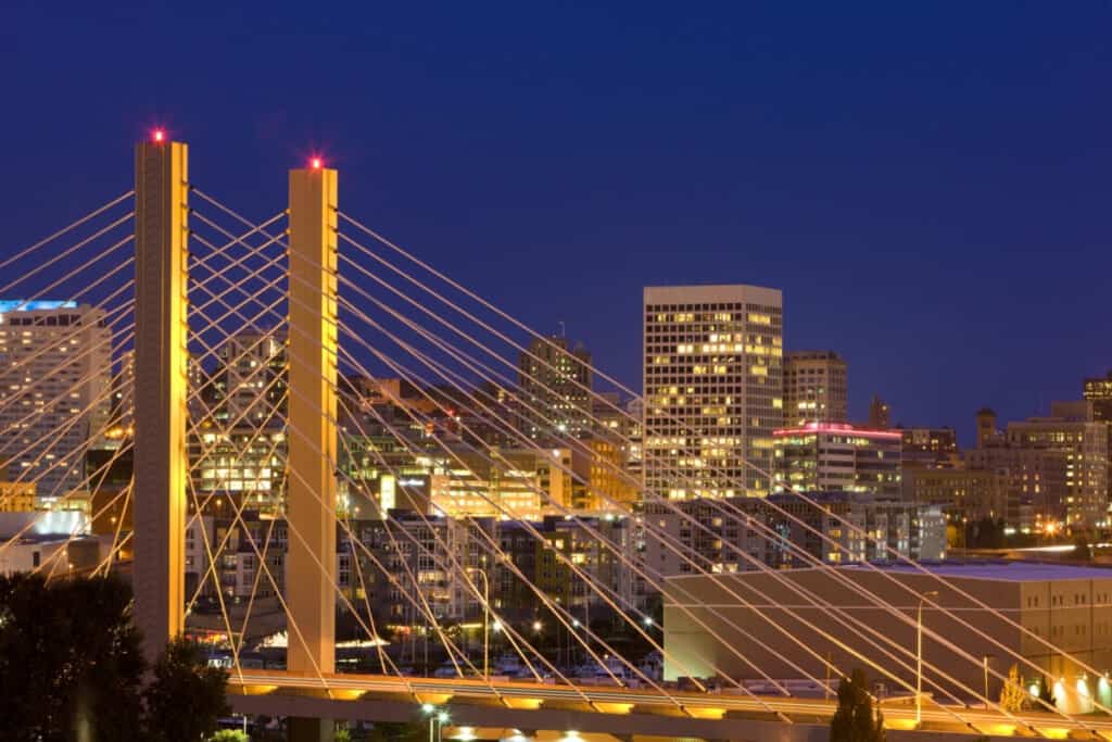 tacpma bridge and city skyline at night
