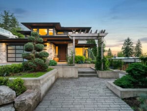 modern home with brick walkway
