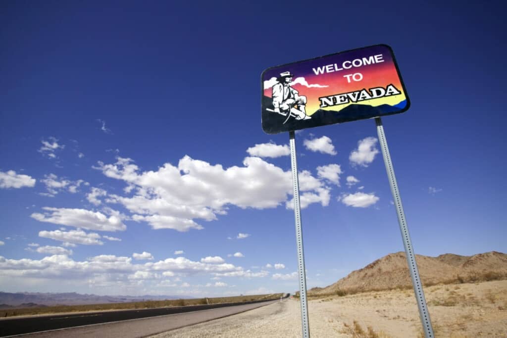 welcome to nevada sign with desert and sky_getty