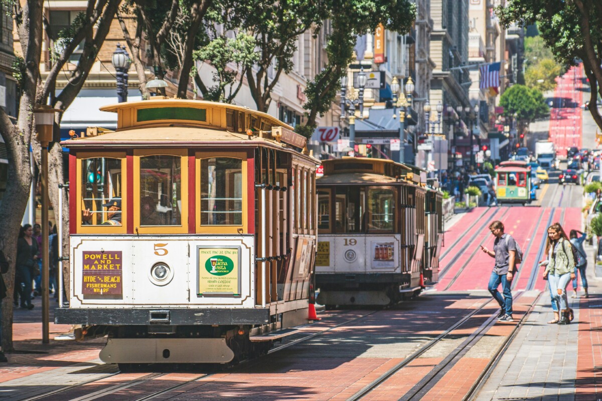 cable car going down powell st in russian hill san francisco