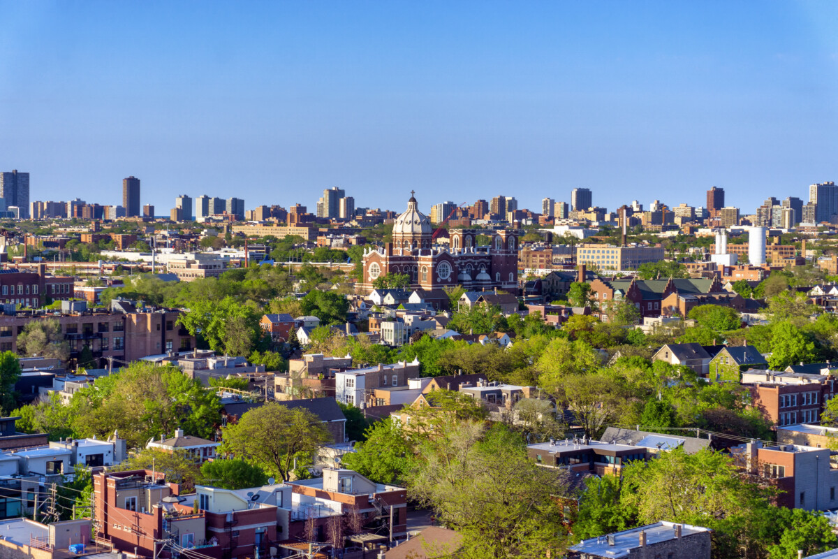 Aerial view of Bucktown neighborhood in Chicago with skyscrapers in the background