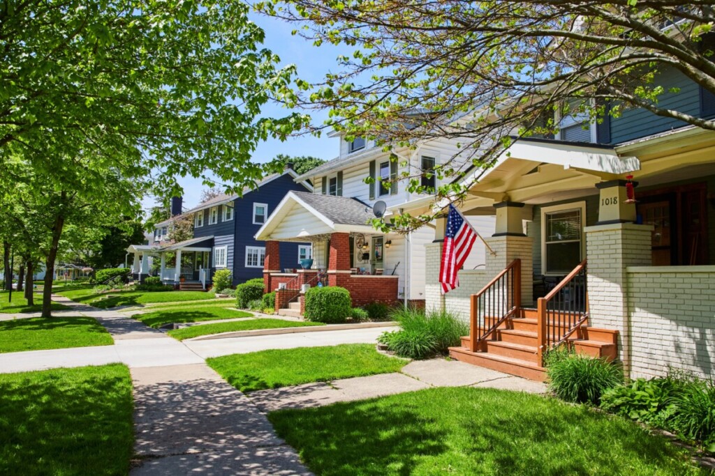 row of nicely maintained suburban houses