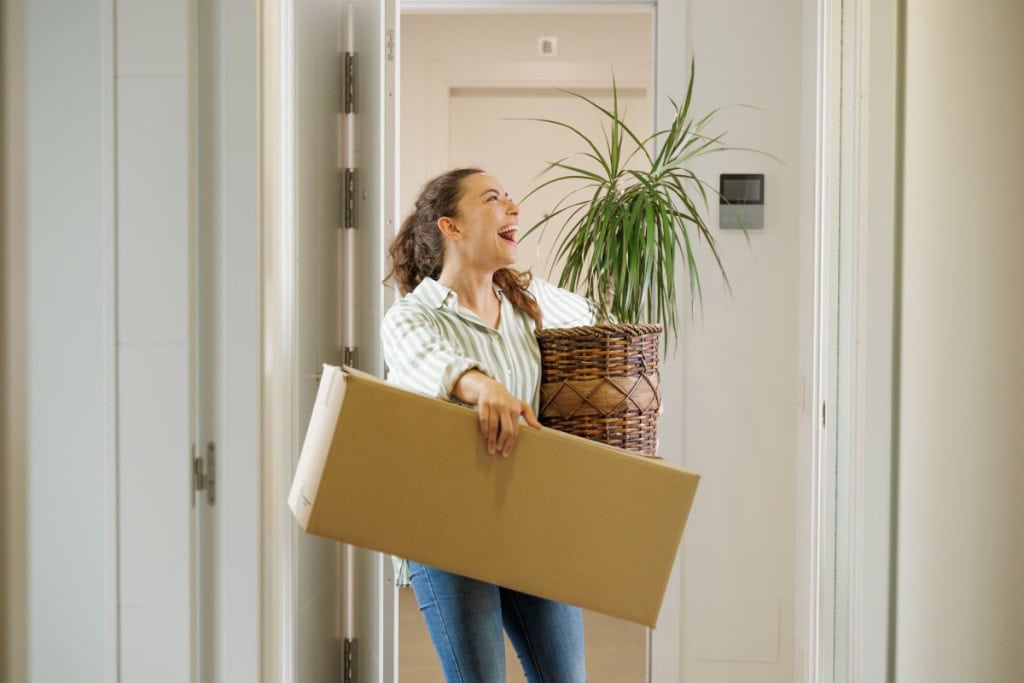 woman packing up to move out of her home