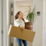 woman packing up to move out of her home