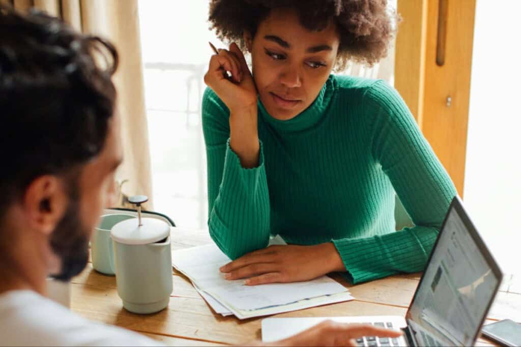 couple looking over their ALTA settlement statement