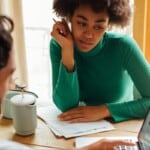 couple looking over their ALTA settlement statement