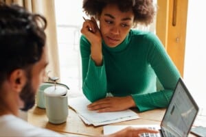 couple looking over their ALTA settlement statement