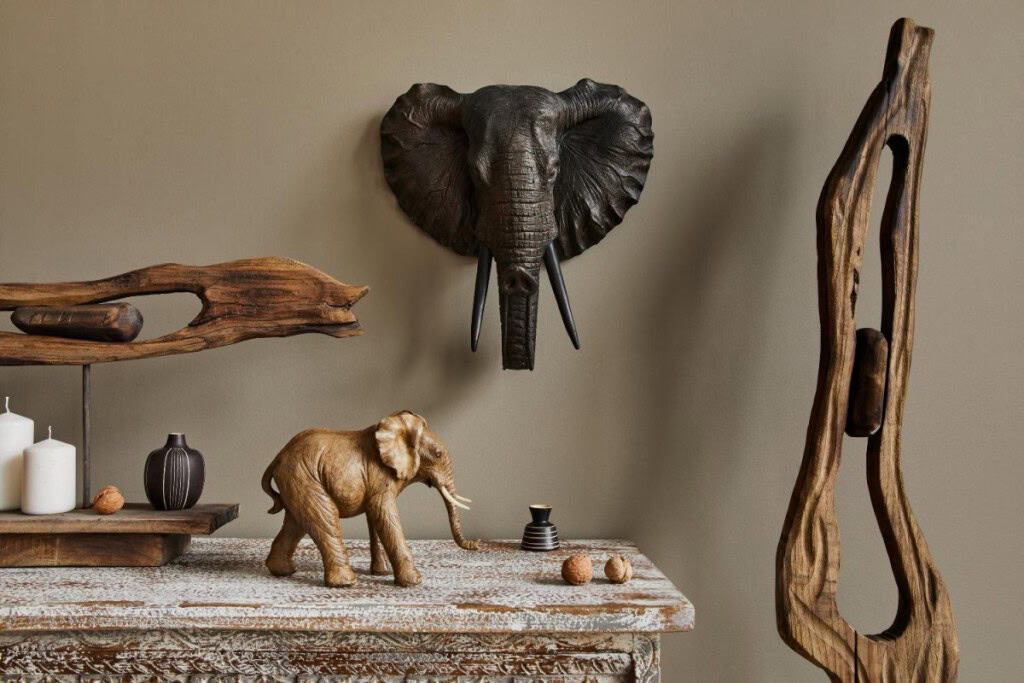 A home embracing the animalcore design trend with elephant motifs and natural wood textures.