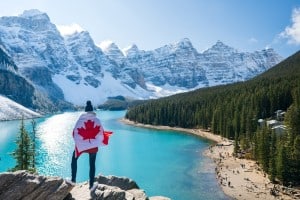 canadian flag at beautiful moraine in canada