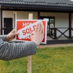 Home sold sign after finding out how much house you can afford with $50k salary.
