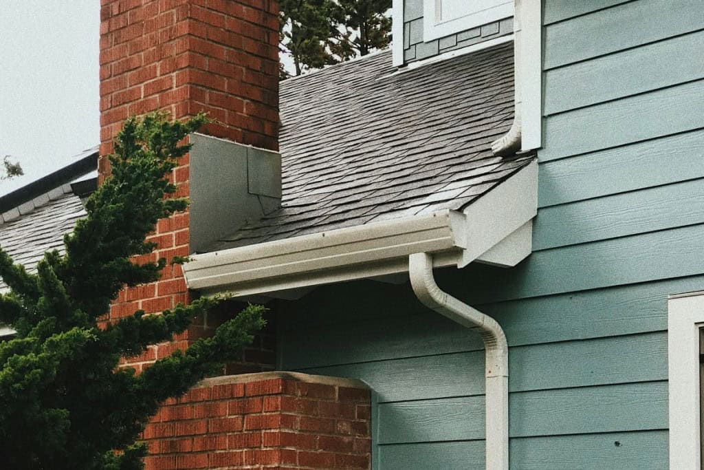 roof and gutter care are key parts of a summer home maintenance checklist