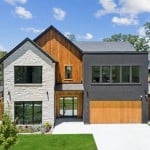 sleek modern dallas tx home with white brick and dark finishes