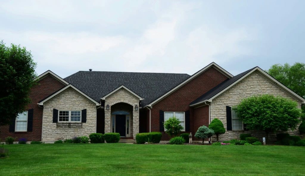 Home with large front lawn that can use creative ways to market the home for sale.