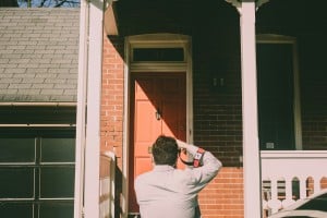 photographer taking an image of the front of a house