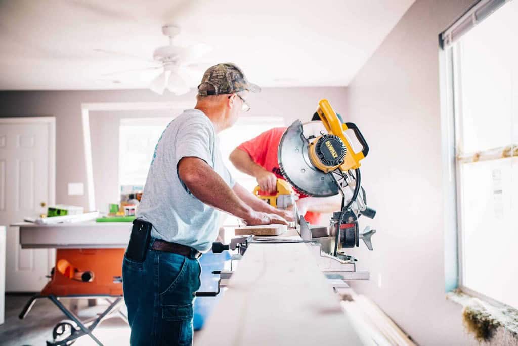 contractor using tools for home improvement project