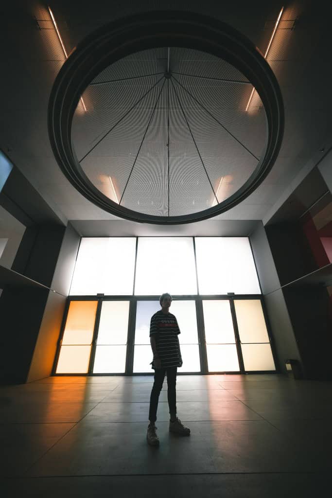 Man standing in large room